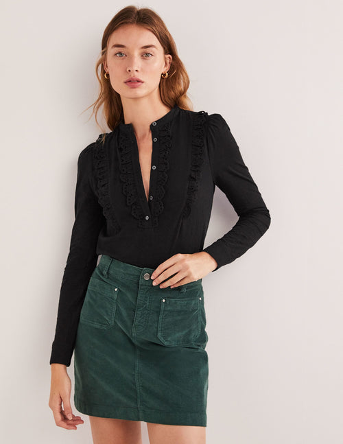 Broderie Ruffle Jersey Top-Black